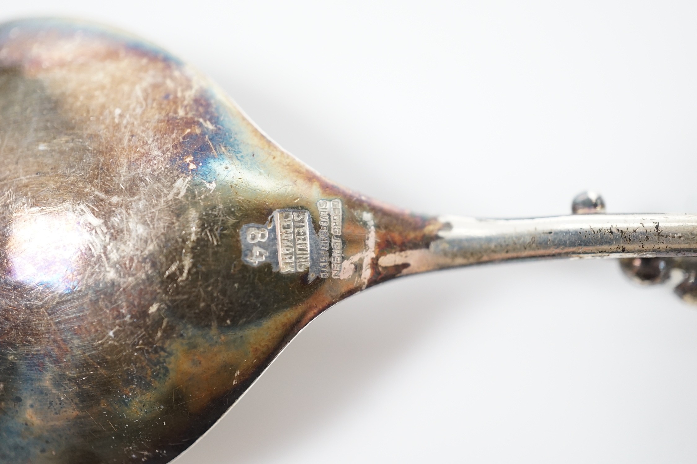 A George VI Georg Jensen silver blossom pattern caddy spoon, import marks for 1948, no.84, 10.2cm.